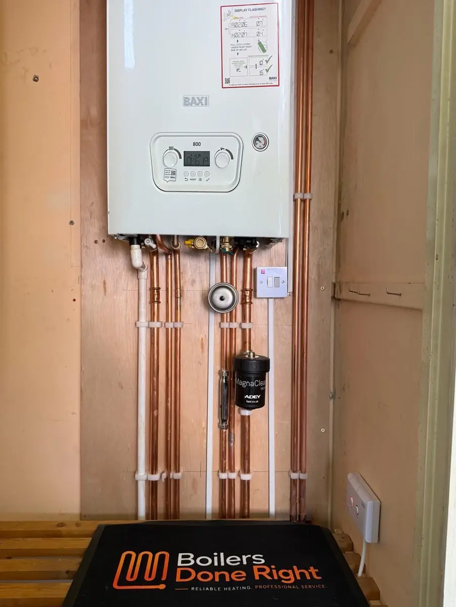 New Baxi 800 combi boiler with neat copper pipework and a magnetic filter, fitted by Boilers Done Right