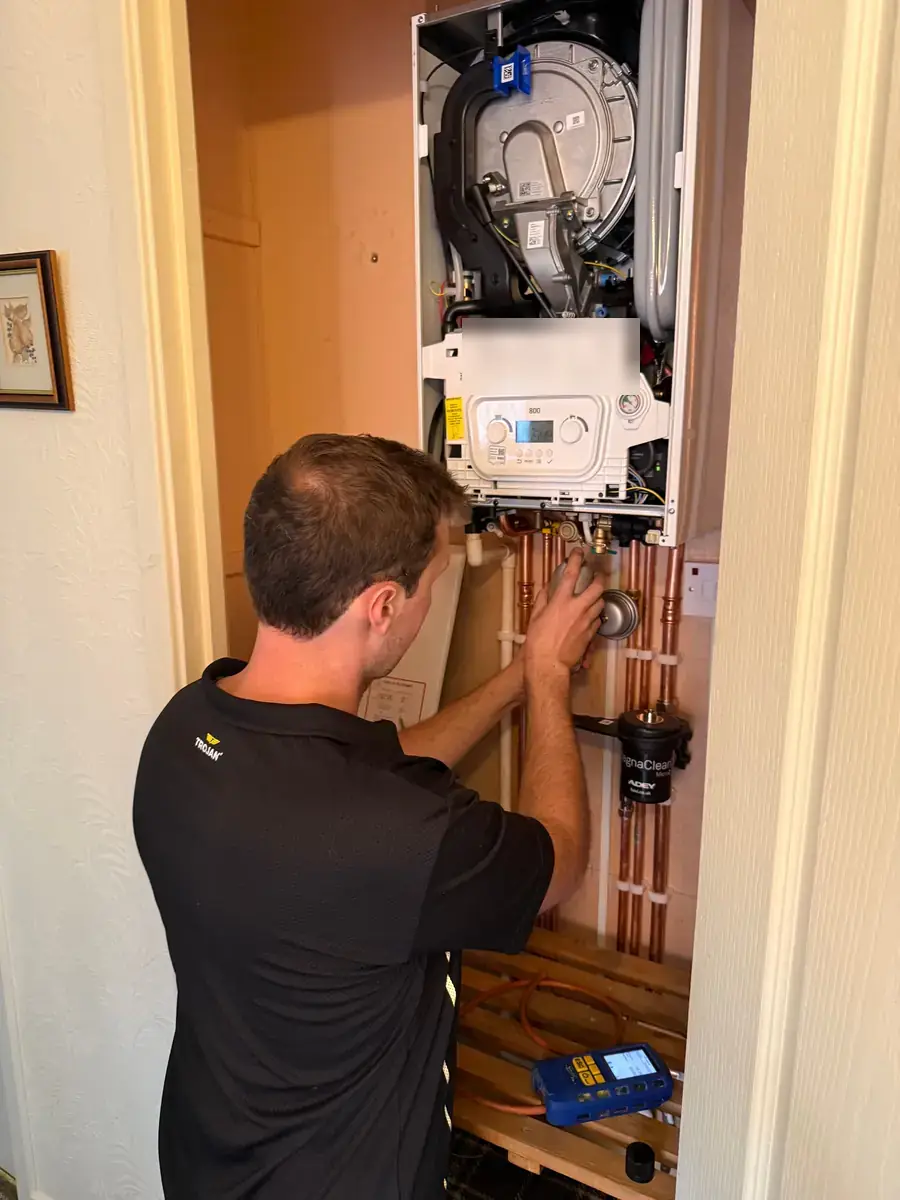 Boilers Done Right engineer connecting up a new Baxi boiler